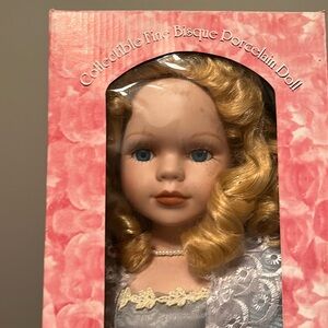 Monica fine bisque porcelain doll. New in box